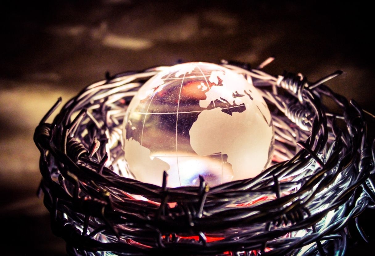 Globe nestled in a nest of barbwire
